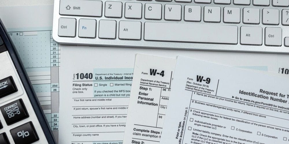 Tax documents on a table.